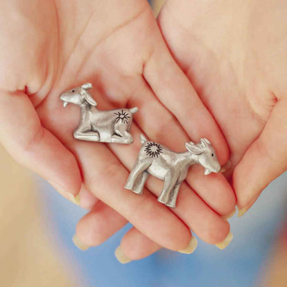 A Pair of Miniature Goats Nativity Figurine Set