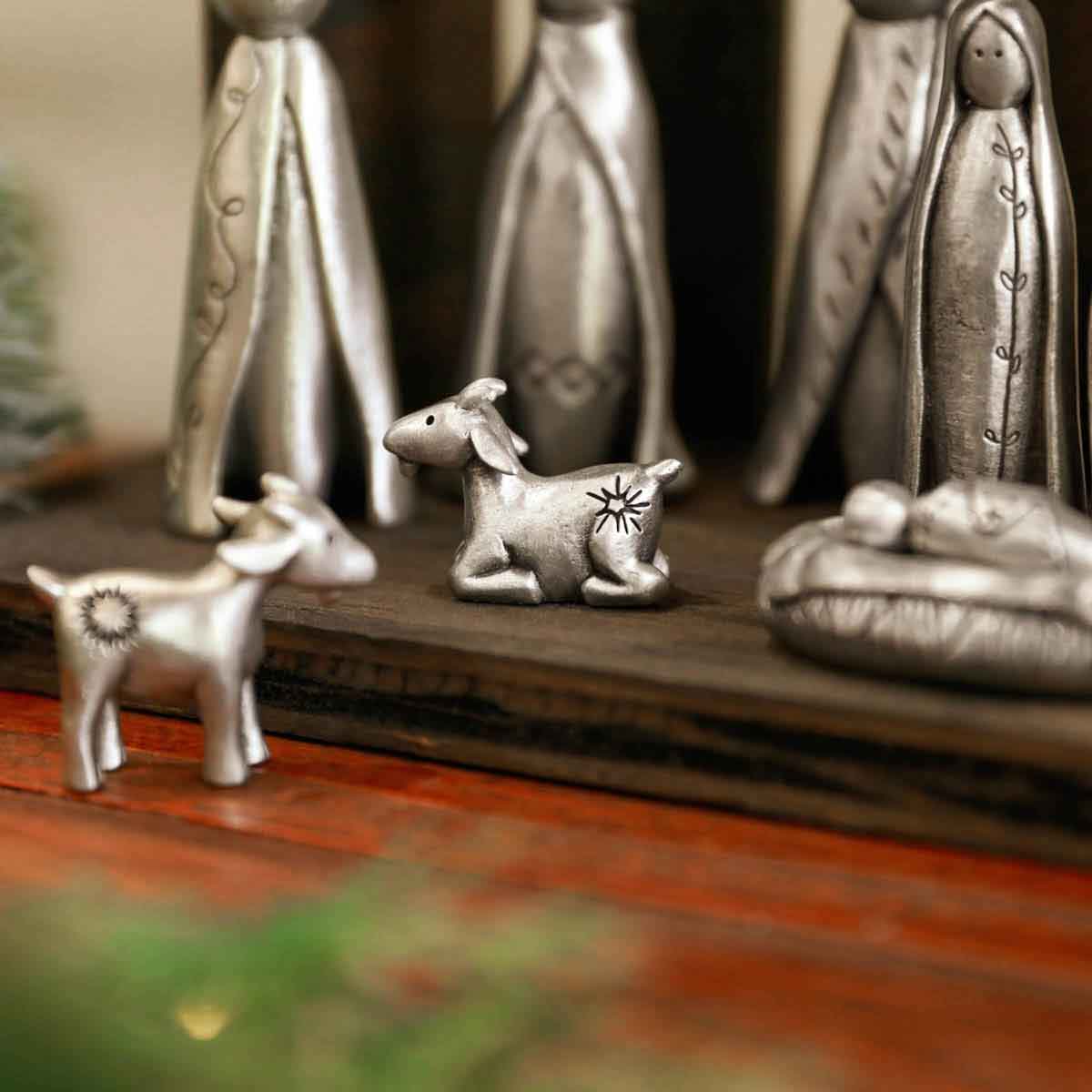 A Pair of Miniature Goats Nativity Figurine Set