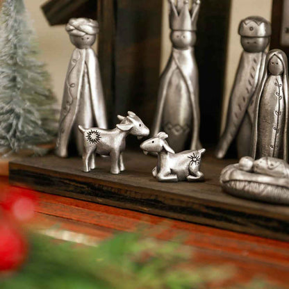 A Pair of Miniature Goats Nativity Figurine Set