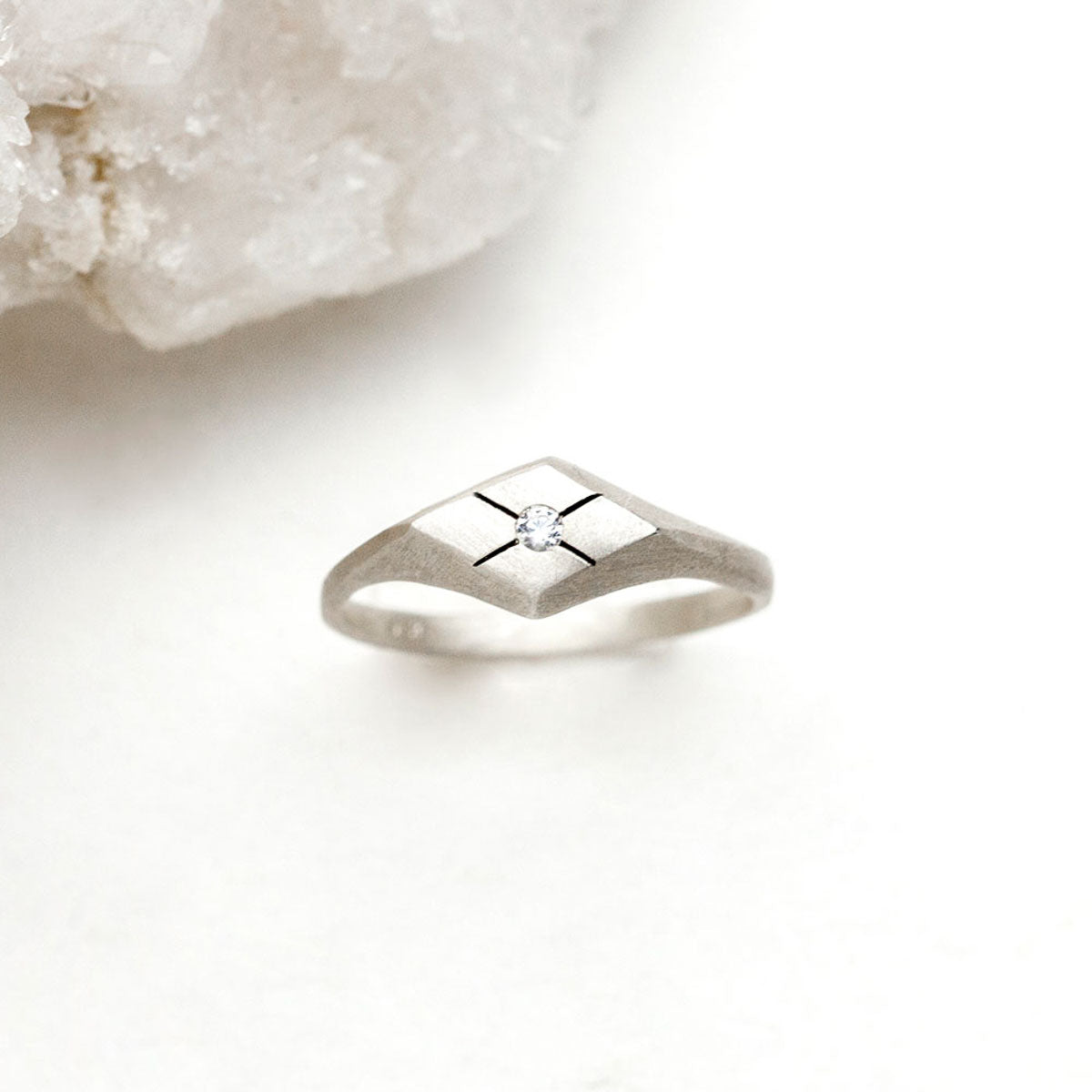 Adored ring hand-molded and cast in sterling silver set with a 2mm genuine diamond