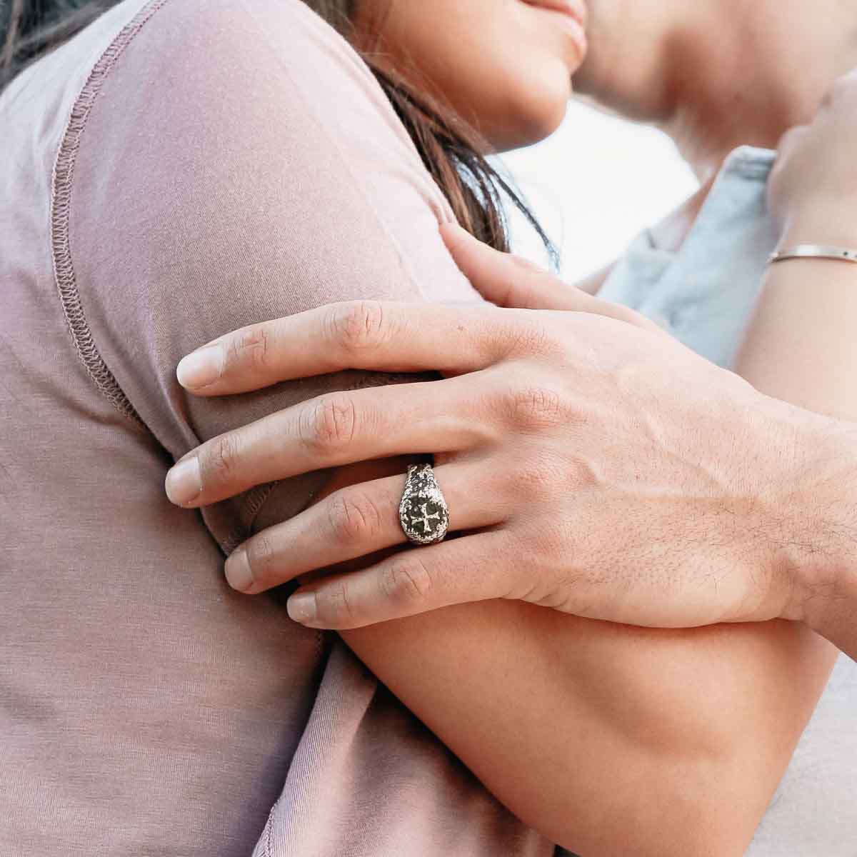 man wearing an Ancient Cross Signet Ring