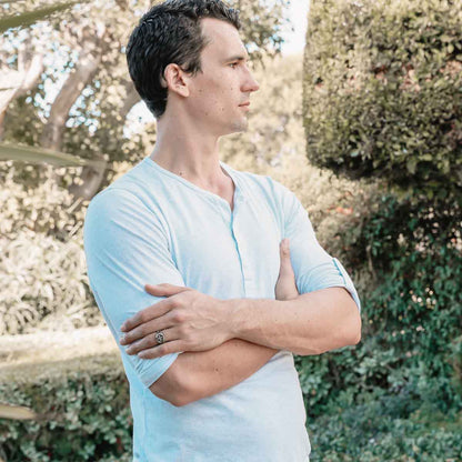 man wearing an Ancient Cross Signet Ring