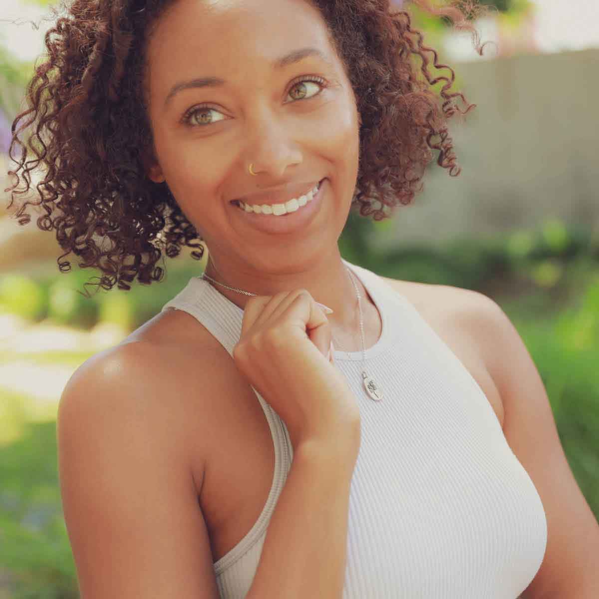 a sterling silver April Birth flower necklace close up