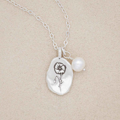 August birth flower necklace handcrafted in sterling silver with a special birth month charm strung with a vintage freshwater pearl