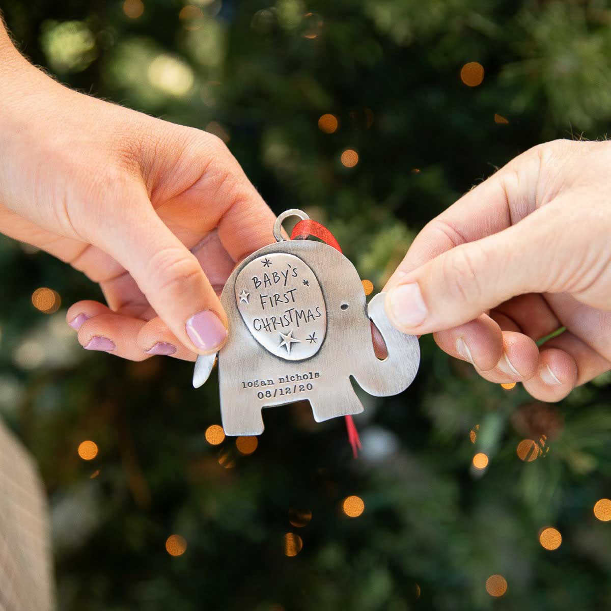  phrase or date being hung on a Christmas tree