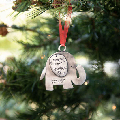 baby's first Christmas ornament of an elephant hand-molded and cast in fine pewter personalized with up to two lines with a name