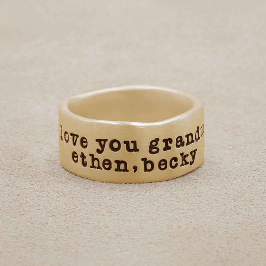 Band together ring handcrafted in 10k yellow gold with an antiqued/satin finish and personalized with words, names, or a quote