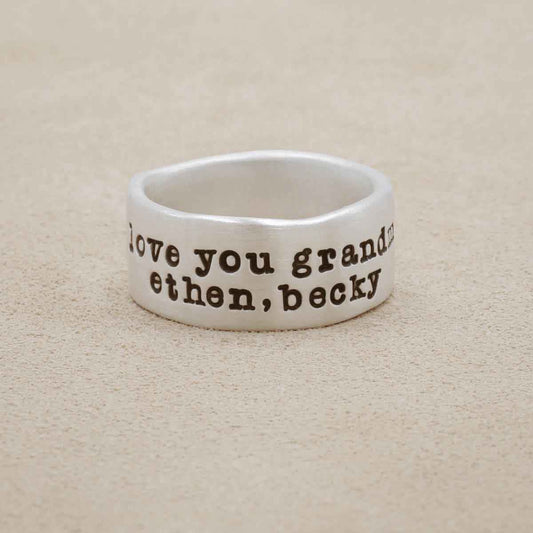 Band together ring handcrafted in sterling silver with an antiqued/satin finish and personalized with words, names, or a quote