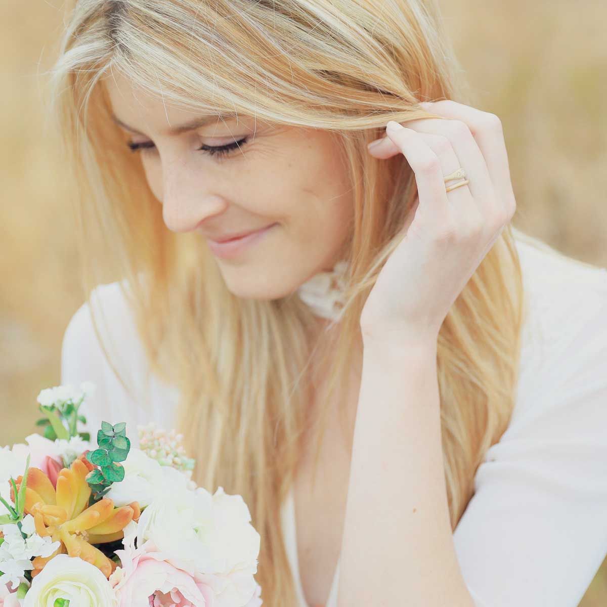 Girl wearing Be mine ring pair hand-molded and cast in 10k yellow gold set with a 3mm birthstone or a diamond 