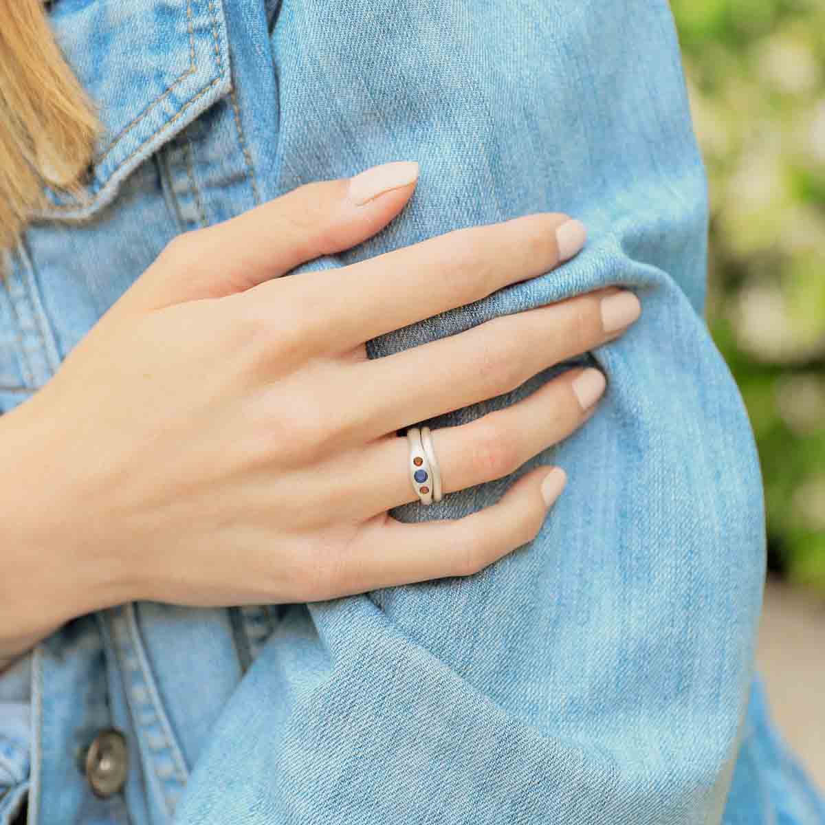 Girl wearing Be mine ring pair hand-molded and cast in sterling silver set with a 3mm birthstone or a diamond