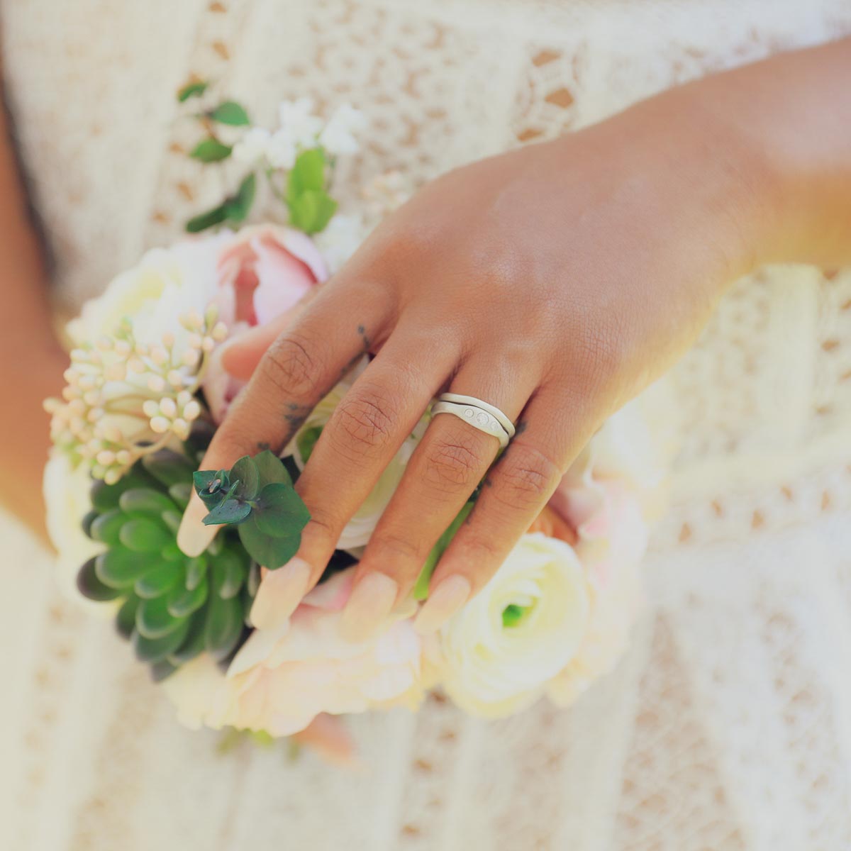 Girl wearing Be mine ring pair hand-molded and cast in sterling silver set with a 3mm birthstone or a diamond