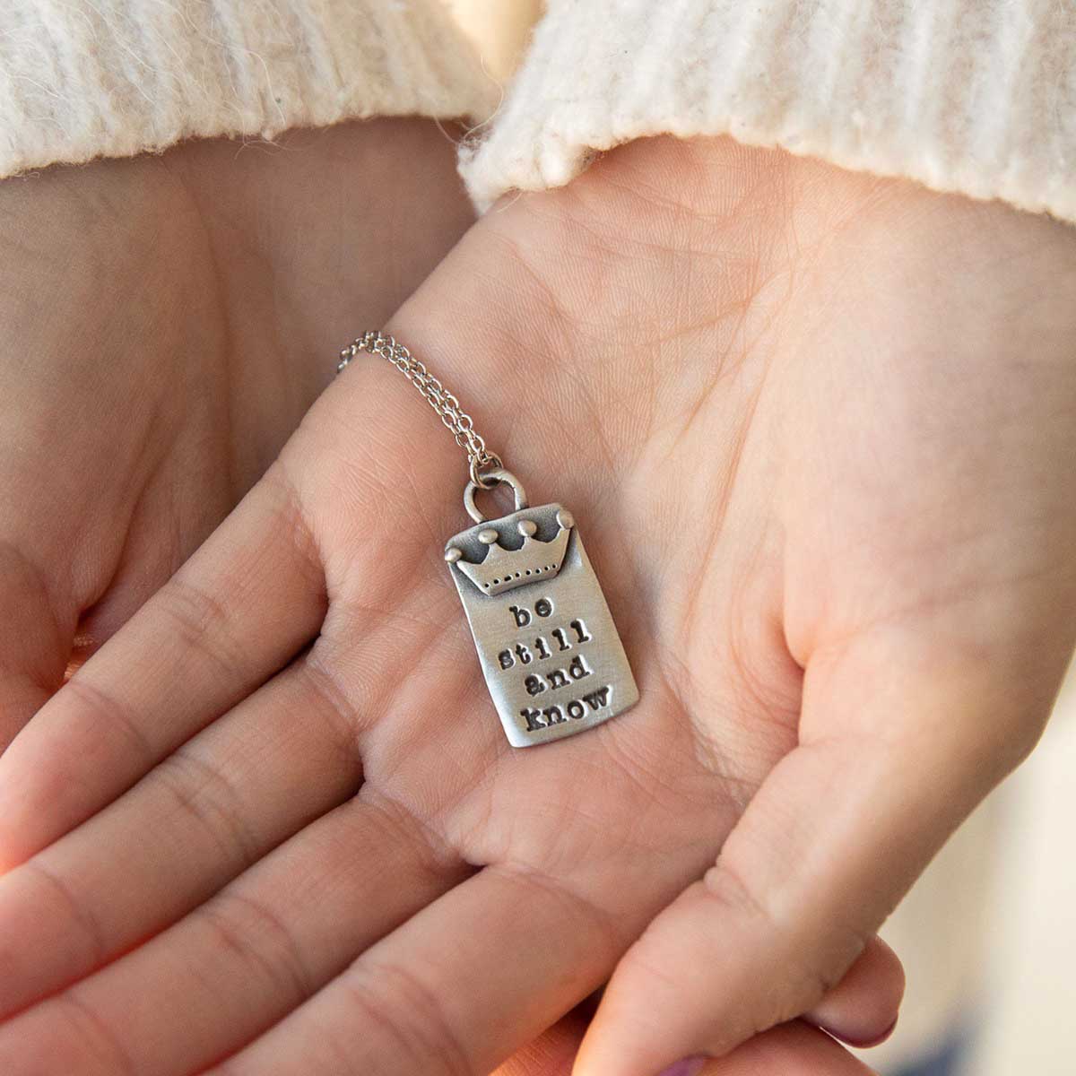 Be still necklace handcrafted in pewter with a matte brushed finish with inscribed message