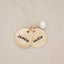 Beloved name disc handcrafted in 10k yellow gold hung with a vintage freshwater pearl and customizable with a name or word