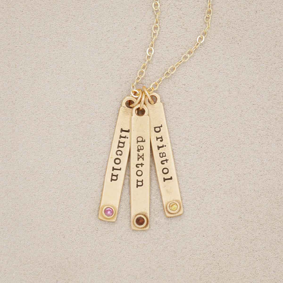 Bezel birthstone necklace handcrafted in 14k yellow gold with choice of genuine stone or diamond and personalized with a special name