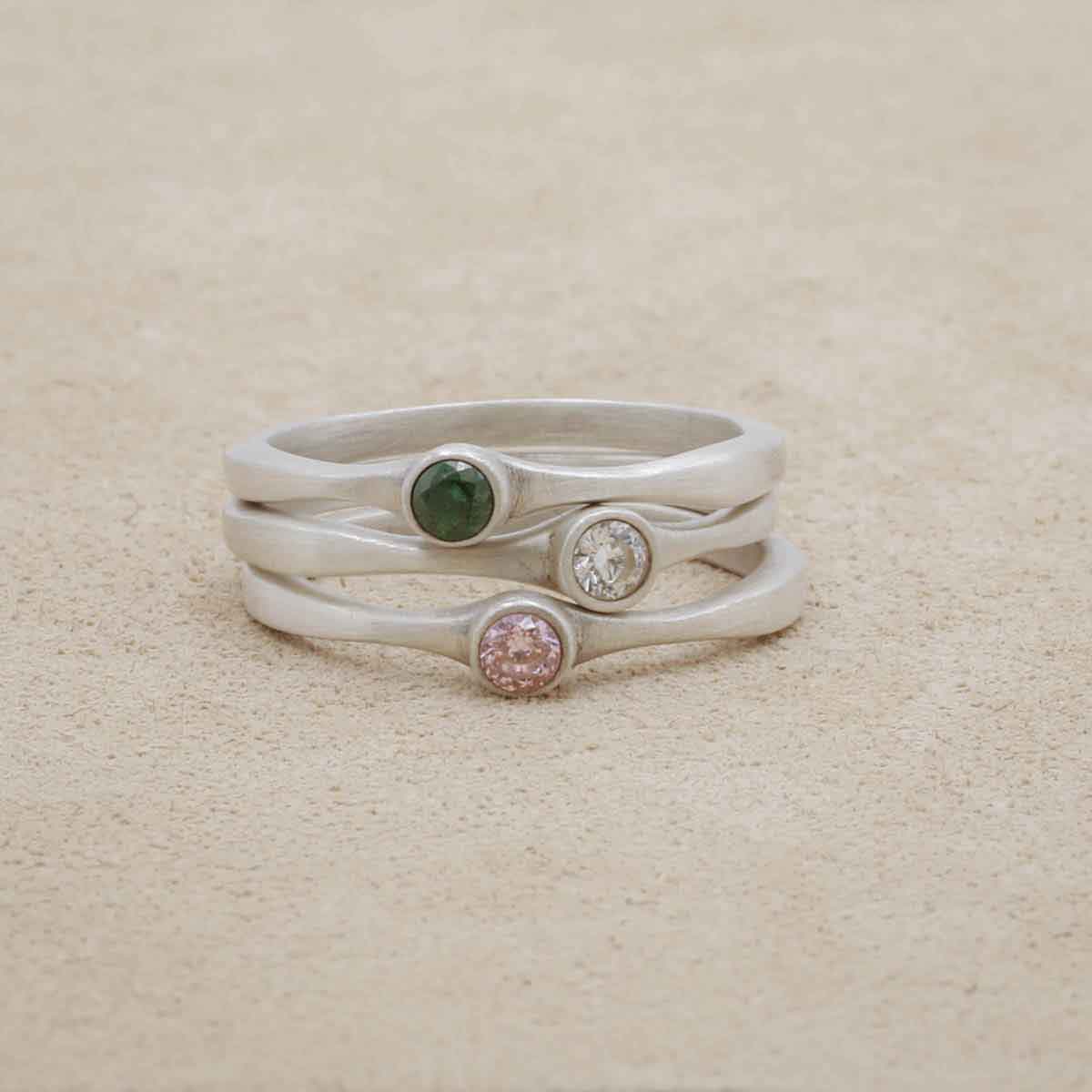 Trio of Bezel birthstone rings handcrafted in sterling silver set with a 3mm birthstone inside a sterling bezel