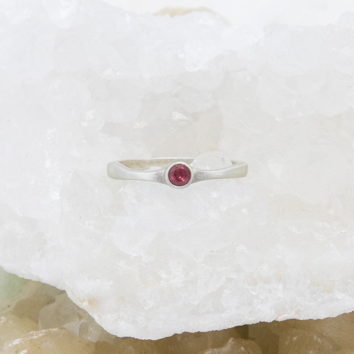 Bezel birthstone ring handcrafted in sterling silver set with a 3mm birthstone inside a sterling bezel