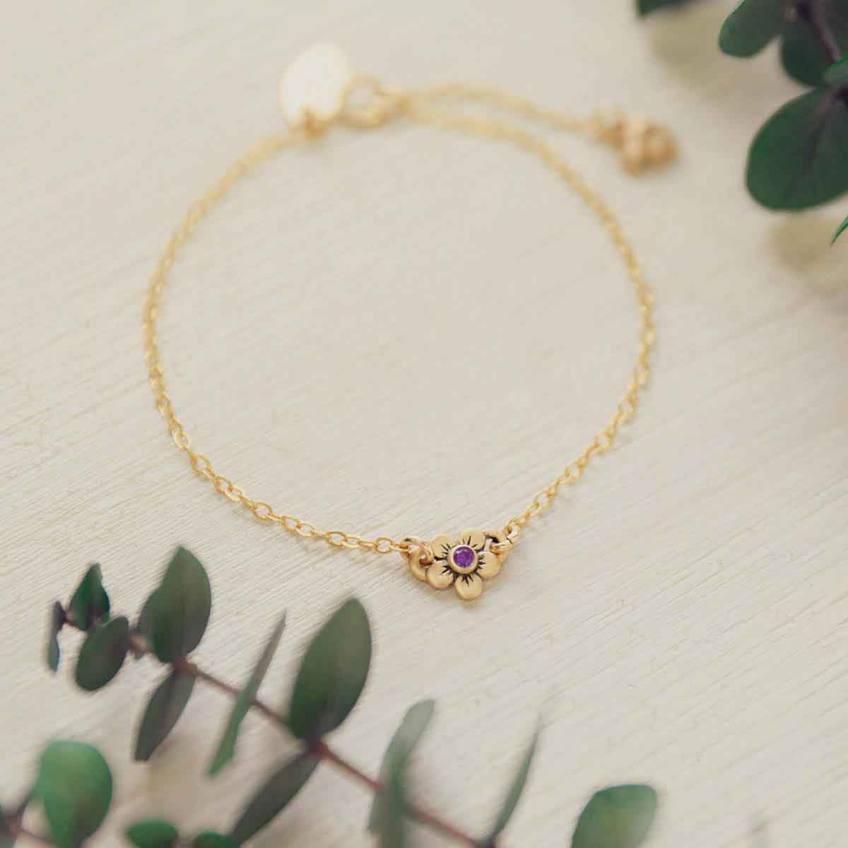 10k gold birthstone bloom bracelets with sweet flower charm and 10k yellow gold lady bug charm