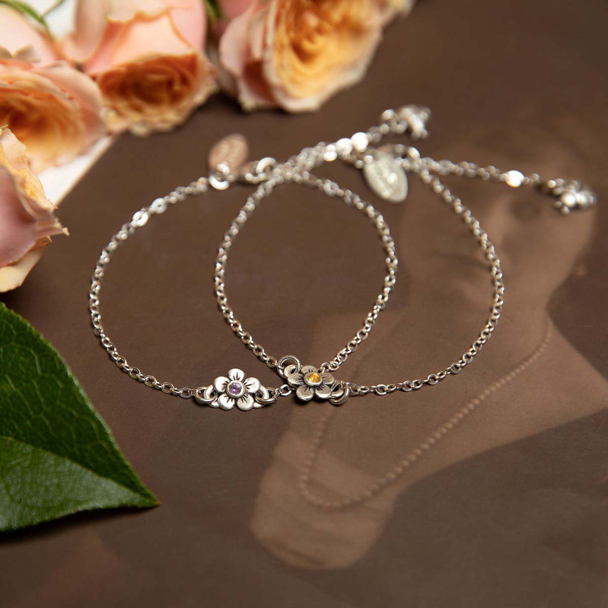 Two sterling silver birthstone bloom bracelet with sweet flower charm and sterling silver lady bug charm