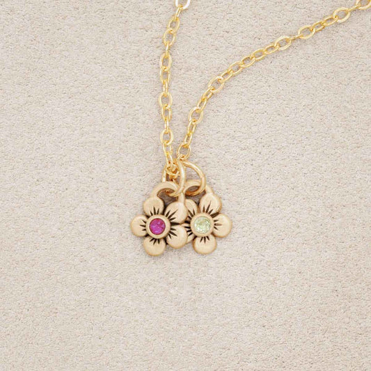 10k yellow gold birthstone bloom necklace with flower charms containing 2mm genuine birthstones