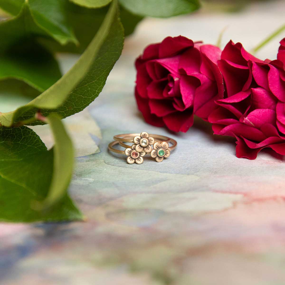 Birthstone bloom ring  handcrafted in 10k yellow gold with an antiqued/satin finish set with a 2mm birthstone 