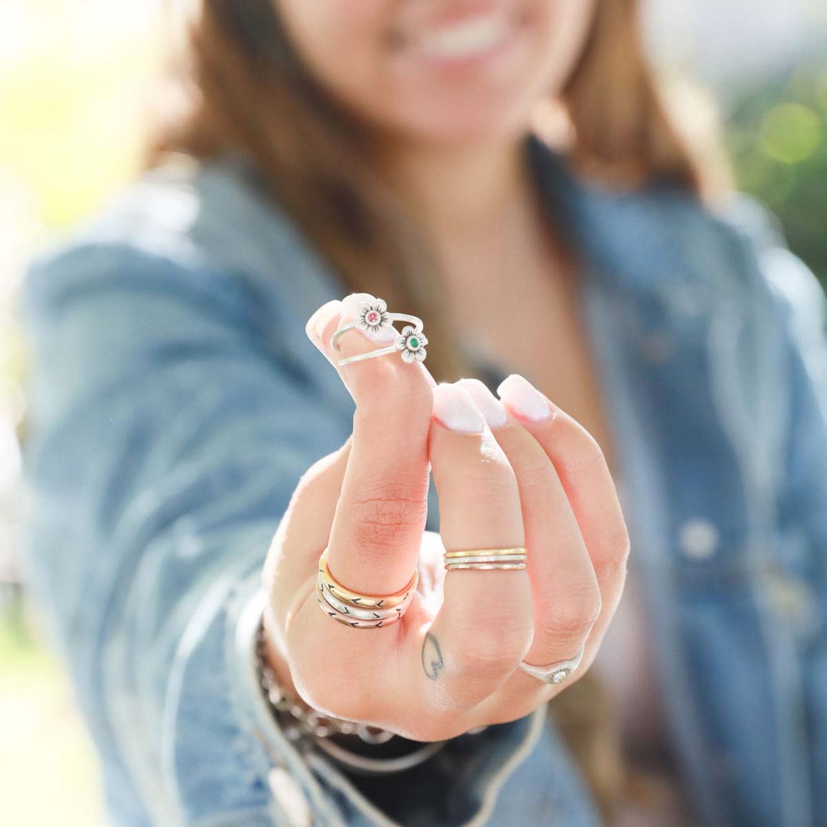 Pair of Birthstone bloom ring  handcrafted in sterling silver with an antiqued/satin finish set with a 2mm birthstone 