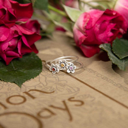 Birthstone bloom ring  handcrafted in sterling silver with an antiqued/satin finish set with a 2mm birthstone 