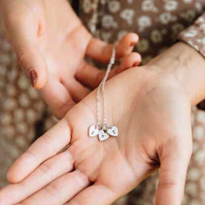 Cherished hearts initials necklace handcrafted in sterling silver including two customizable sterling silver charms