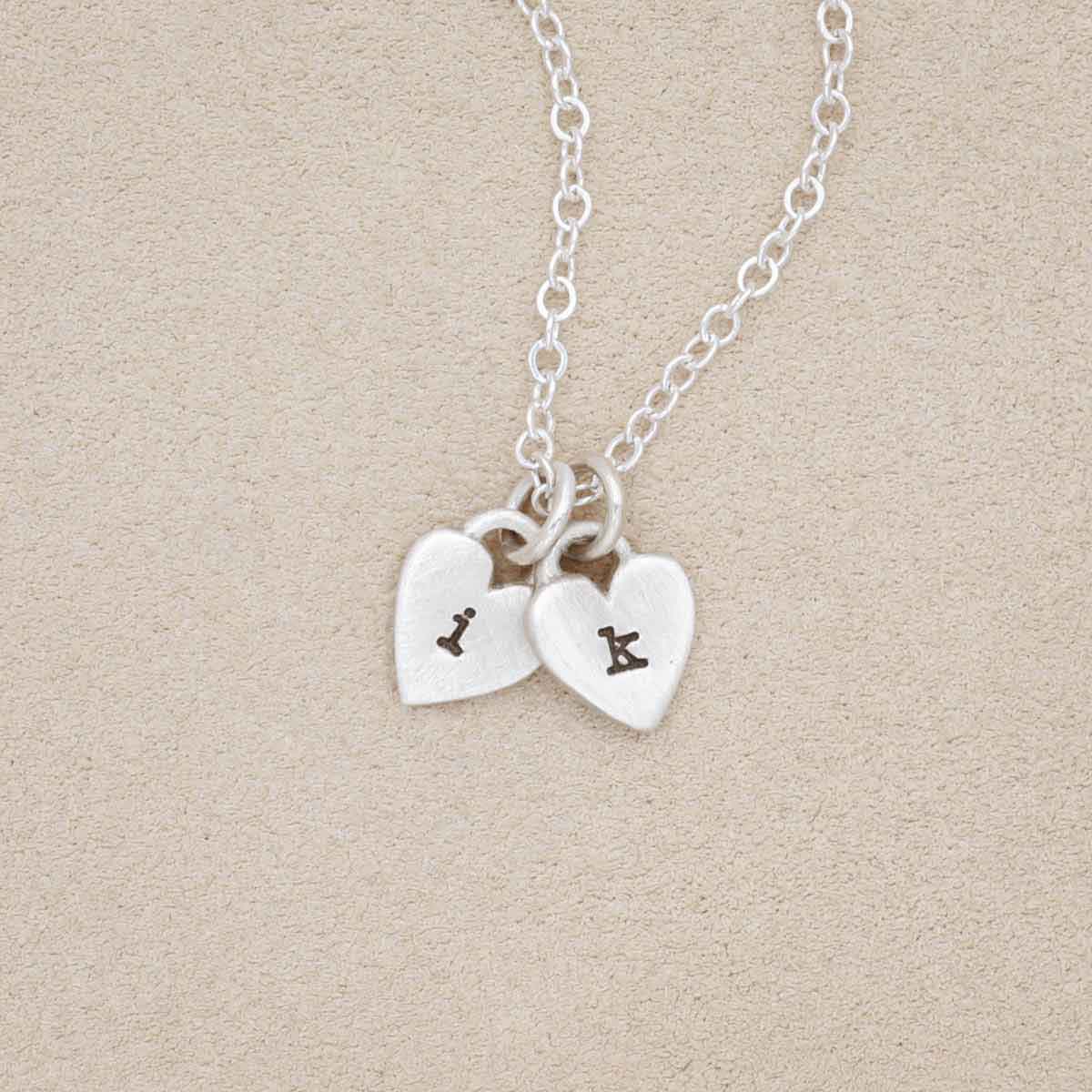 Cherished hearts initials necklace handcrafted in sterling silver including two customizable sterling silver charms