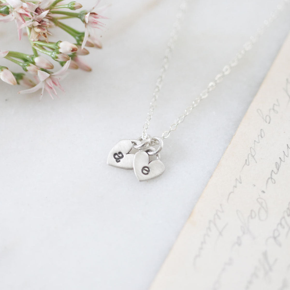 Cherished hearts initials necklace handcrafted in sterling silver including two customizable sterling silver charms