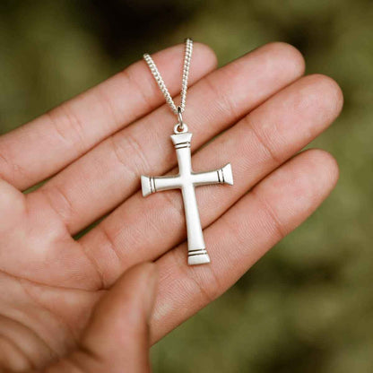 man wearing a sterling silver Chosen Cross Necklace