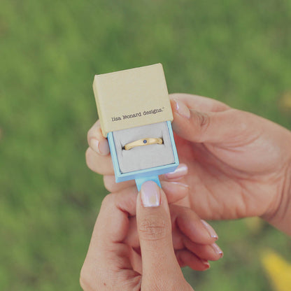 Classic stacking ring hand-molded and cast in 14k yellow gold with a 2mm birthstone or diamond 