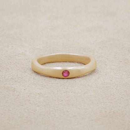 Classic stacking ring hand-molded and cast in 10k yellow gold with a 2mm birthstone or diamond