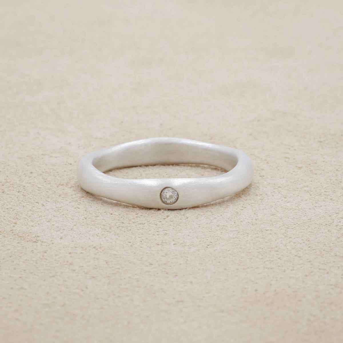 Classic stacking ring hand-molded and cast in sterling silver with a 2mm birthstone or diamond