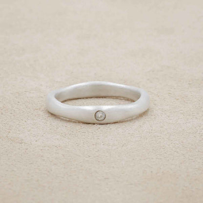 Classic stacking ring hand-molded and cast in sterling silver with a 2mm birthstone or diamond