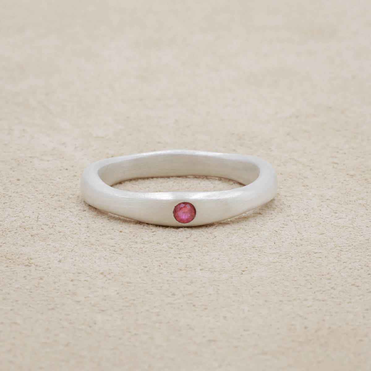 Classic stacking ring hand-molded and cast in sterling silver with a 2mm birthstone or diamond