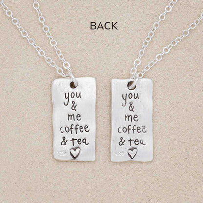 Coffee and tea necklace set handcrafted in sterling silver with a matte brushed finish with engravings to be connected and shared with someone