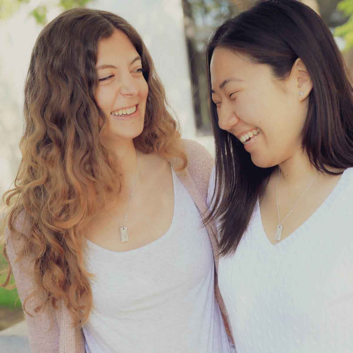 Girls wearing their Coffee and tea necklace set handcrafted in sterling silver