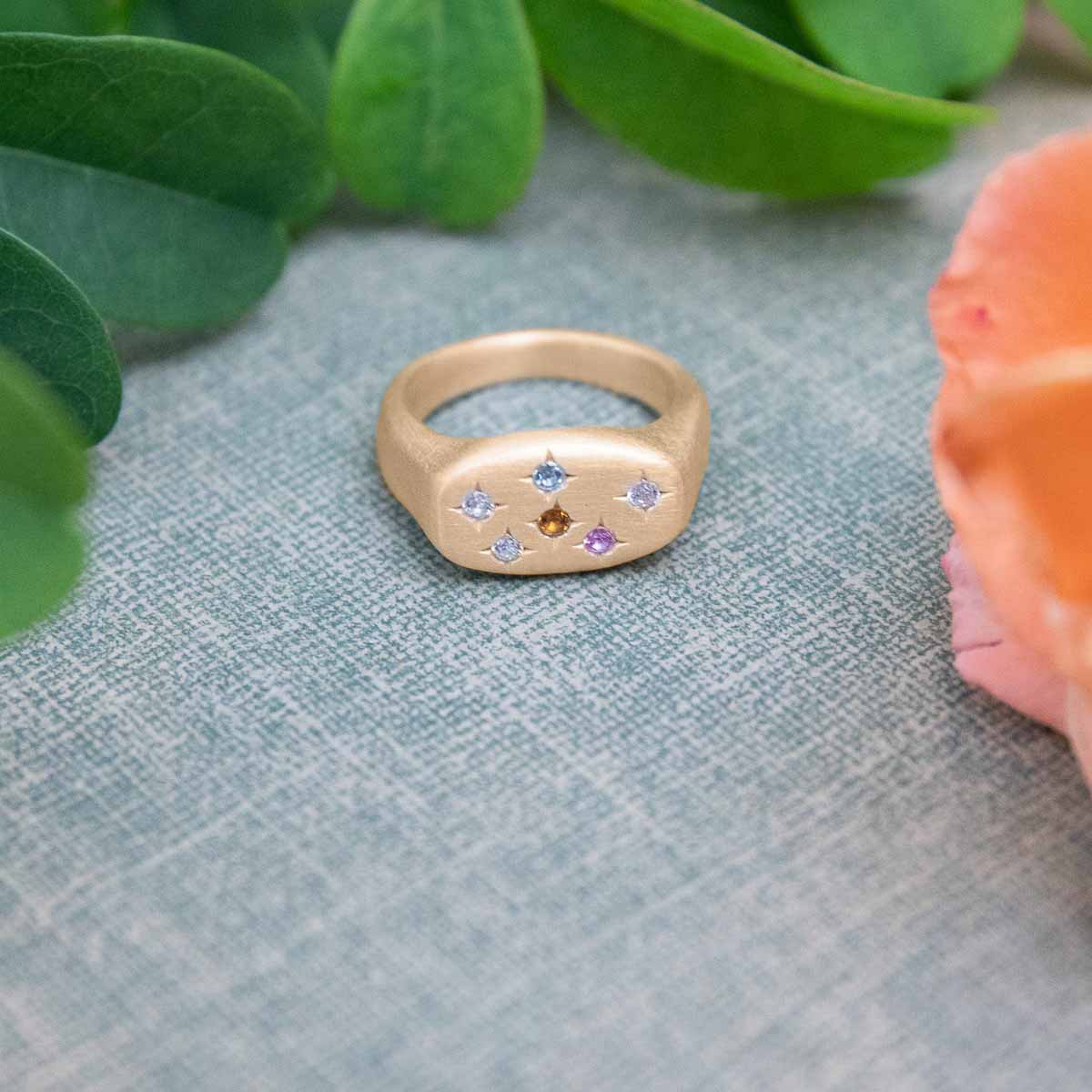 Constellation ring handcrafted in 14k yellow gold set with birthstones and crystal gemstones 