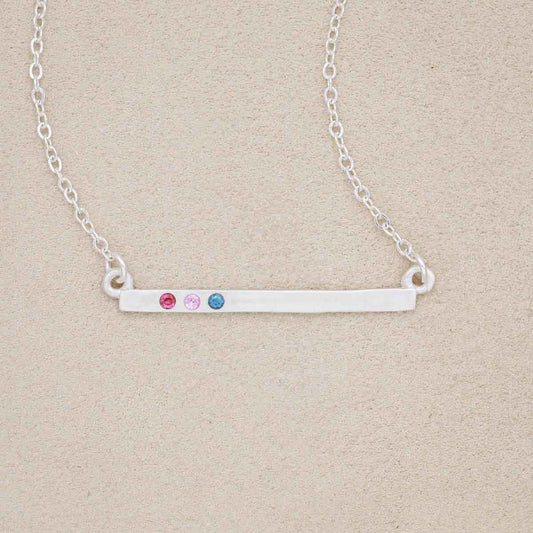 sterling silver cross bar birthstone necklace strung on a silver link chain customizable with up to 7 genuine 2mm birthstones