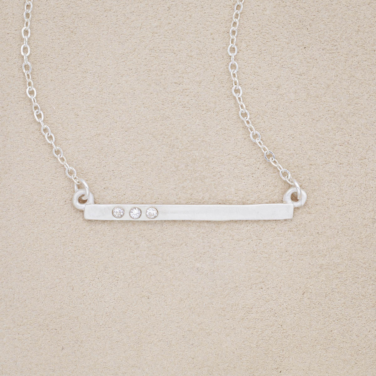 Cross bar crystal necklace handcrafted in sterling silver  hand-set with up to four 2mm cubic zirconia stones