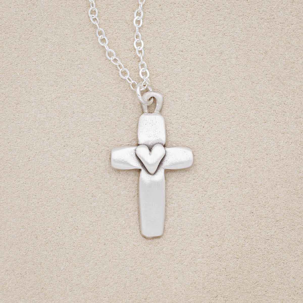 Handcrafted sterling silver cross of faith necklace strung on a sterling silver link chain