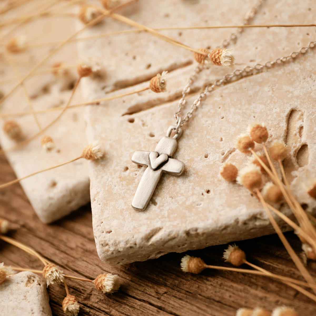 Handcrafted sterling silver cross of faith necklace strung on a sterling silver link chain