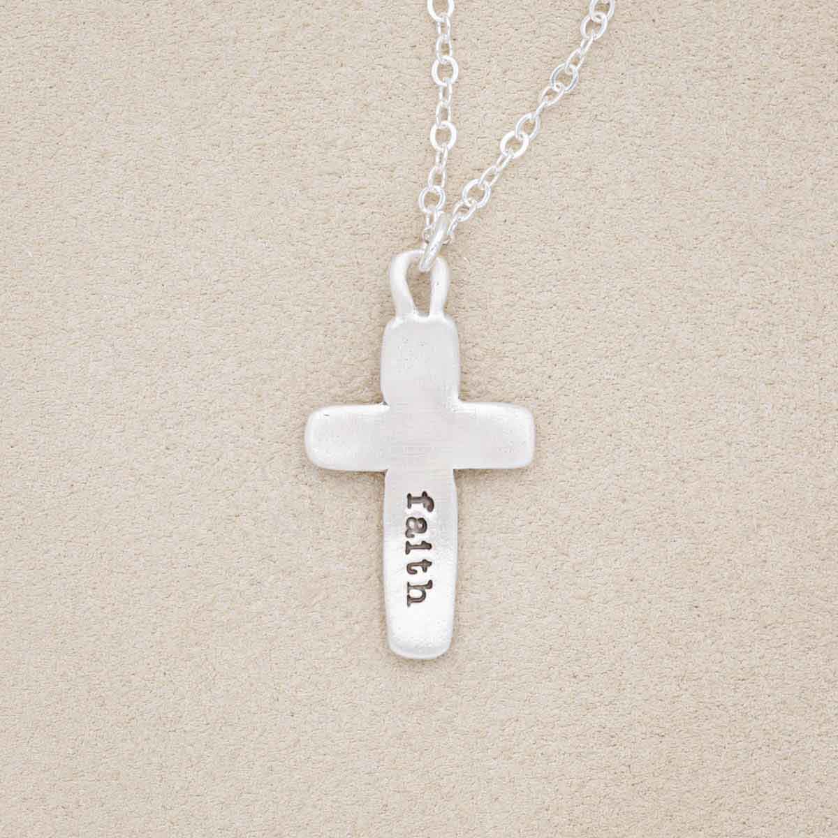 Handcrafted sterling silver cross of faith necklace strung on a sterling silver link chain