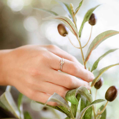 sterling silver and yellow gold dainty finespun birthstone rings with striped ribbon