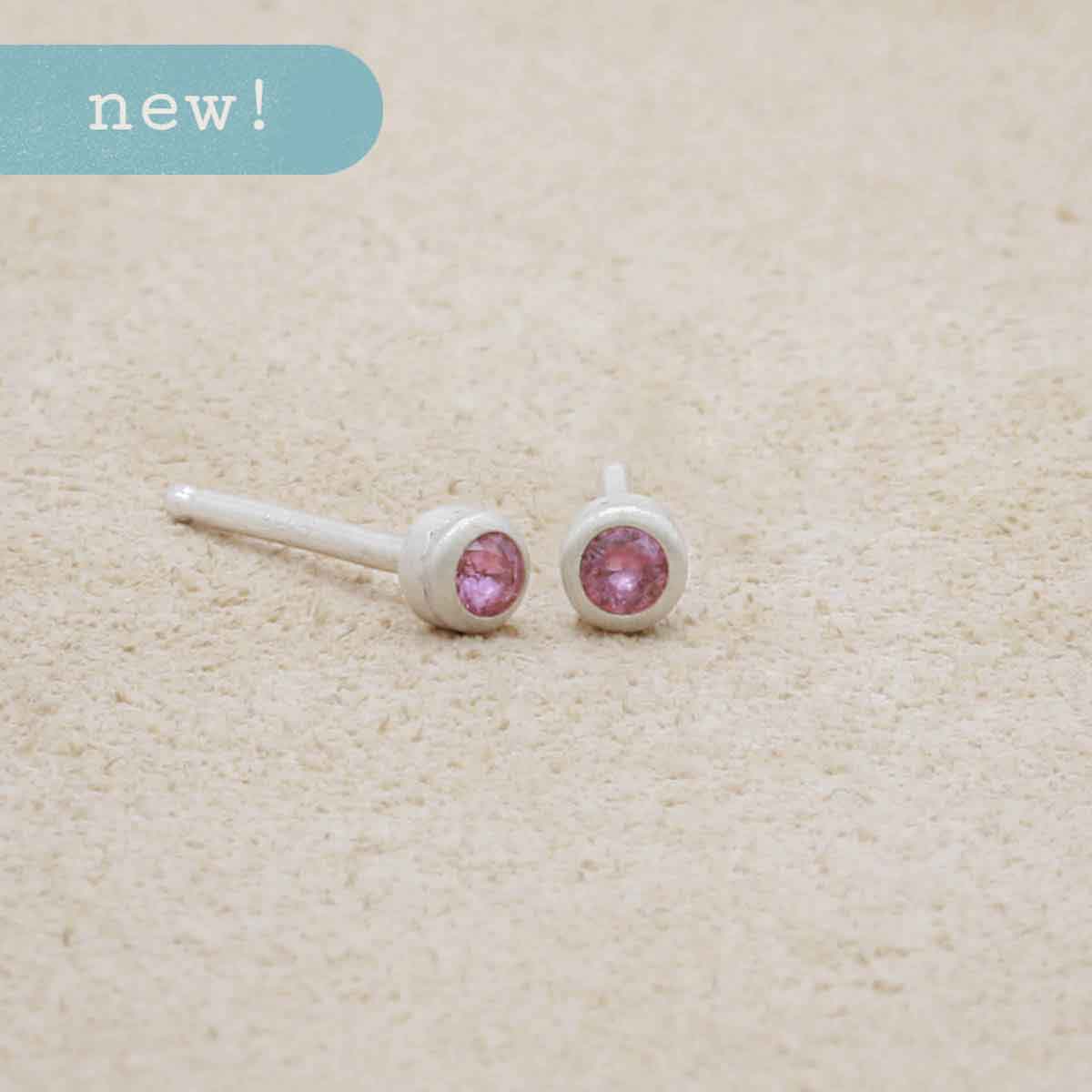 Dainty Finespun Birthstone Stud Earrings - Small in sterling silver on a beige background