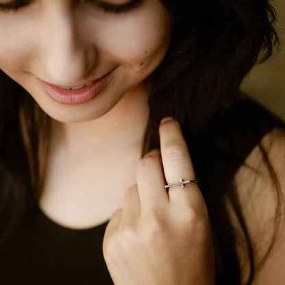 woman wearing a blackened sterling silver Dimensions Cross Ring