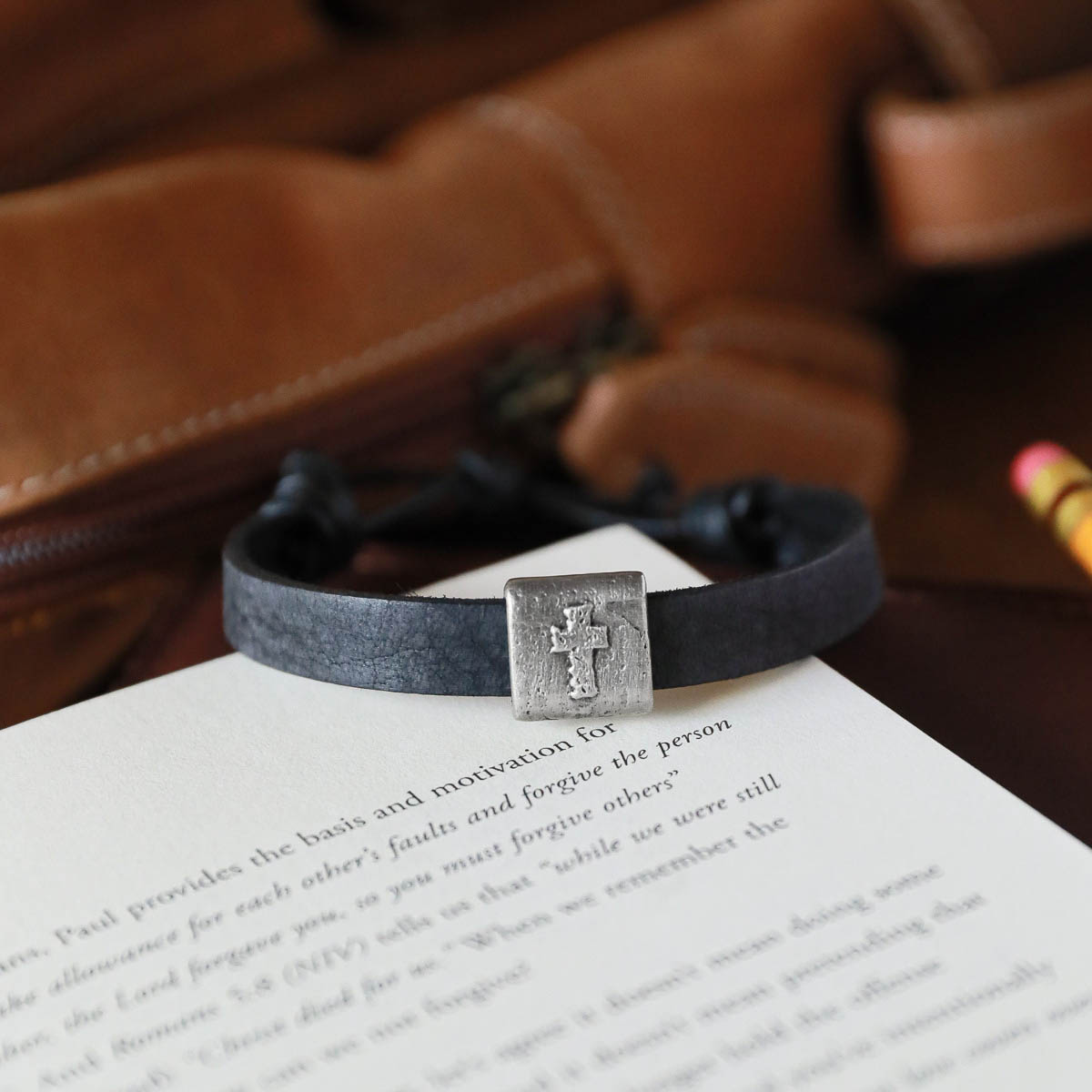 Equitable Leather Cross bracelet handcrafted in black latigo leather with a pewter bead