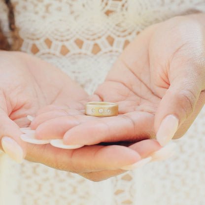 Faith Hope and Love ring hand-molded in 10k yellow gold set with a 3mm birthstone or diamond and two 2mm stones on the sides 