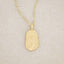 gold plated February birth flower necklace with an 18" gold filled link chain, on a beige background