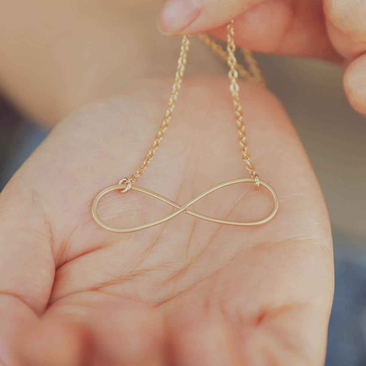  For Always Infinity Necklace in her backyard